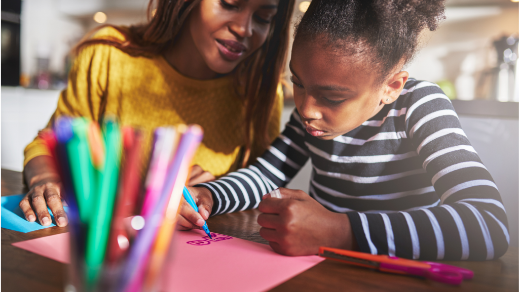 COVID homeschooling black mum teaches daughter